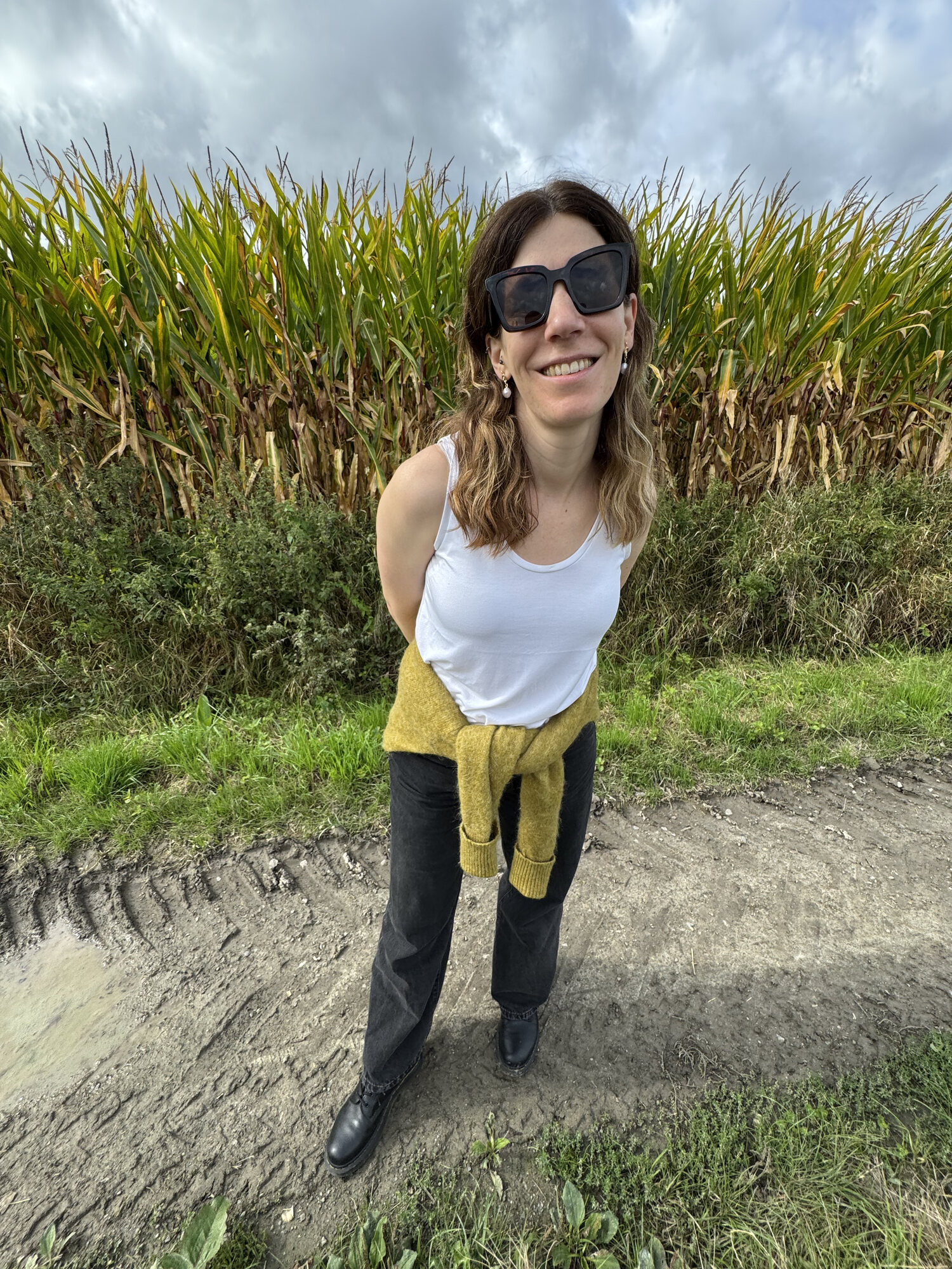 Clare in front of a corn field